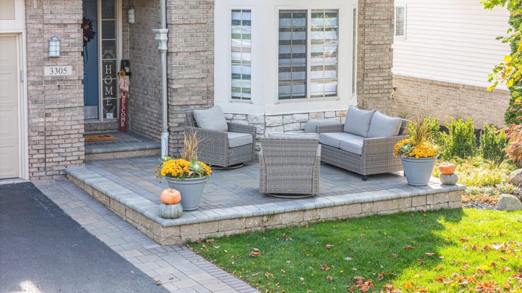 A custom brick paver patio featured in our landscape design portfolio.