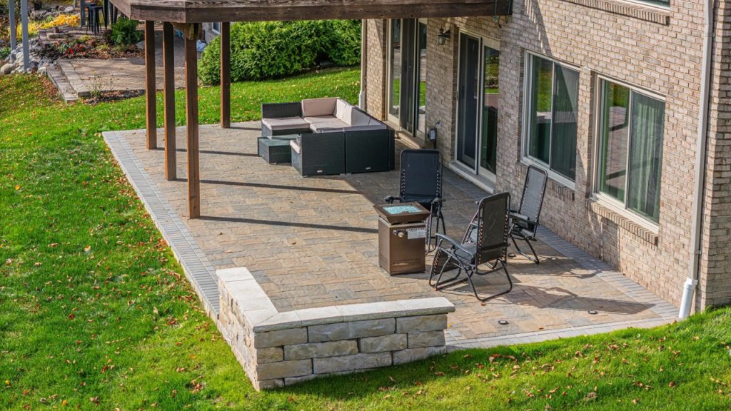 A custom brick paver patio featured in our landscape design portfolio.