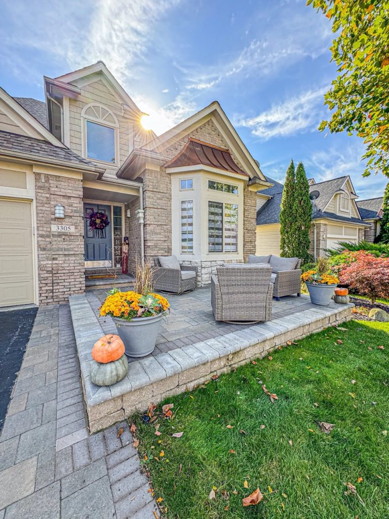 A custom brick paver patio featured in our landscape design portfolio.